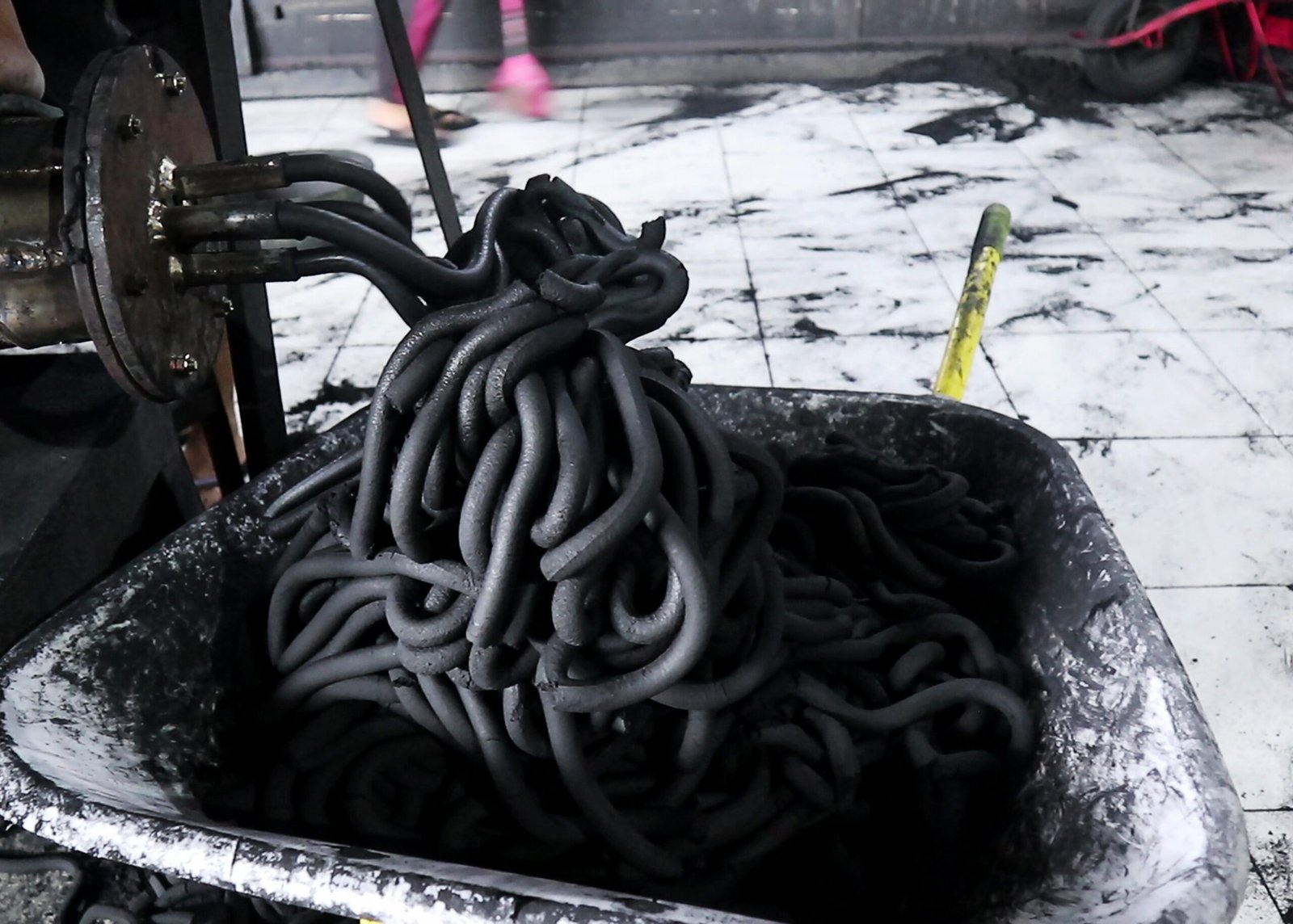 Blending coconut shell charcoal powder for premium briquettes