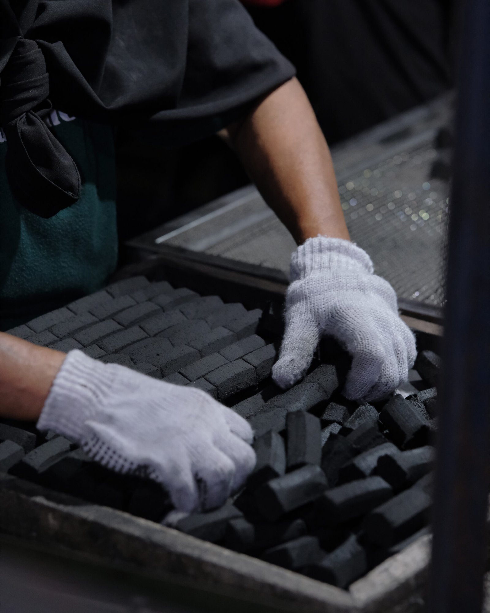 Indonesian factory producing premium coconut shell charcoal briquettes
